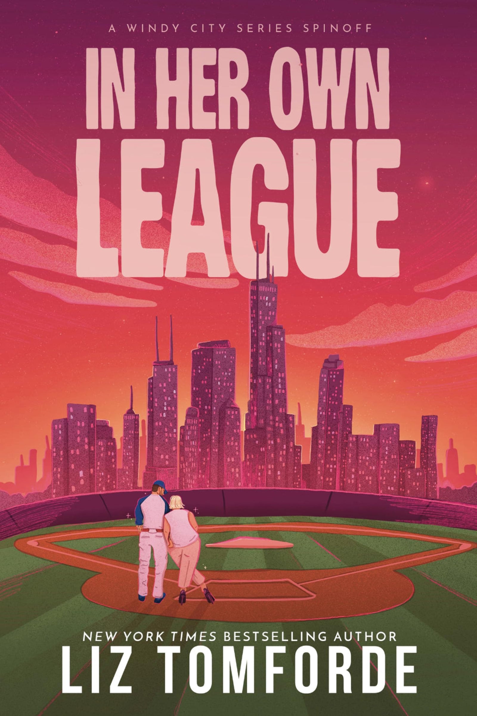 Book cover of 'In Her Own League' with a city skyline and two people on a baseball field.